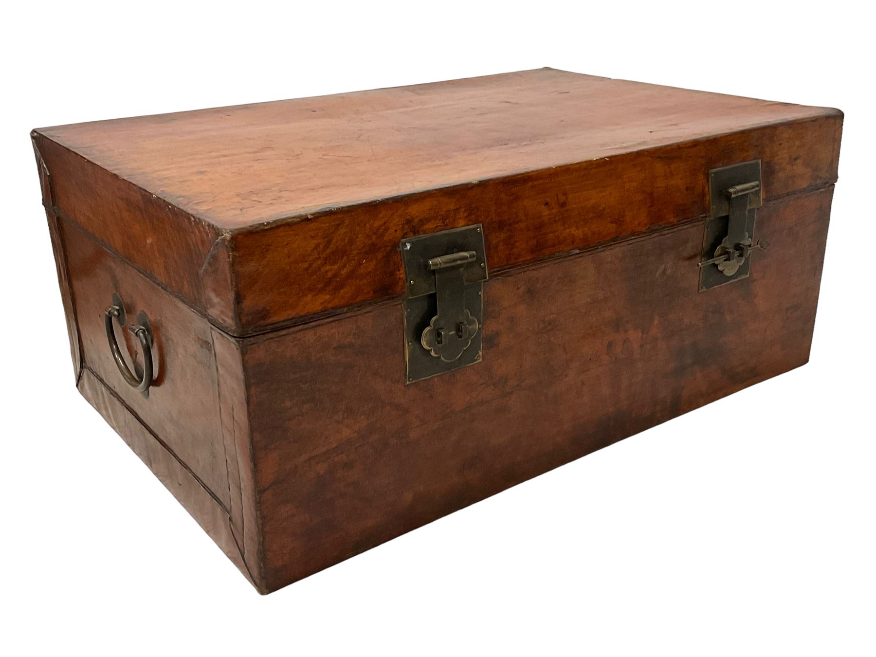 Chinese leather bound and wooden trunk, fitted with metal locks and twin carrying handles, on ebonised stand 