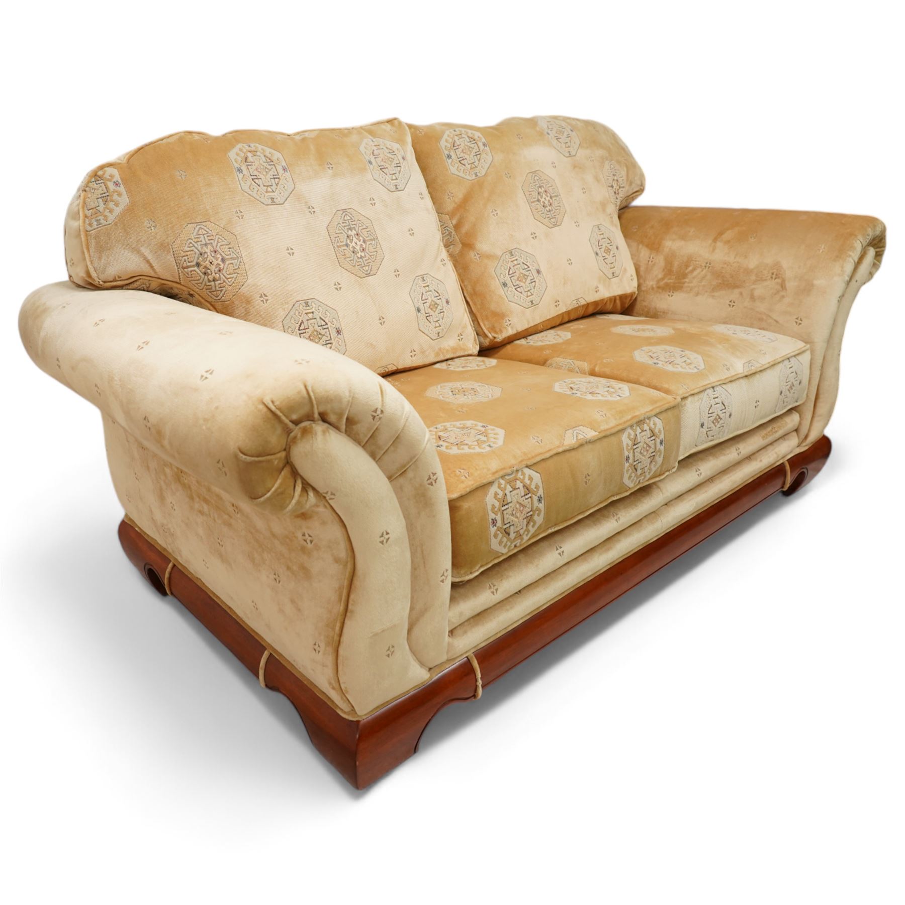 Three-seat sofa (W197cm, D103cm) and pair of matching armchairs (W100cm); upholstered in pale gold fabric decorated with Gul motifs, hardwood framed with polished base