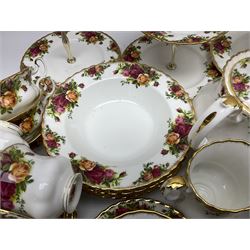 Royal Albert Old Country Roses pattern tea and dinner service, including teapot, coffee pot, two milk jugs, two open sucriers, six teacups and saucers, six dinner plates, six soup bowls, etc  