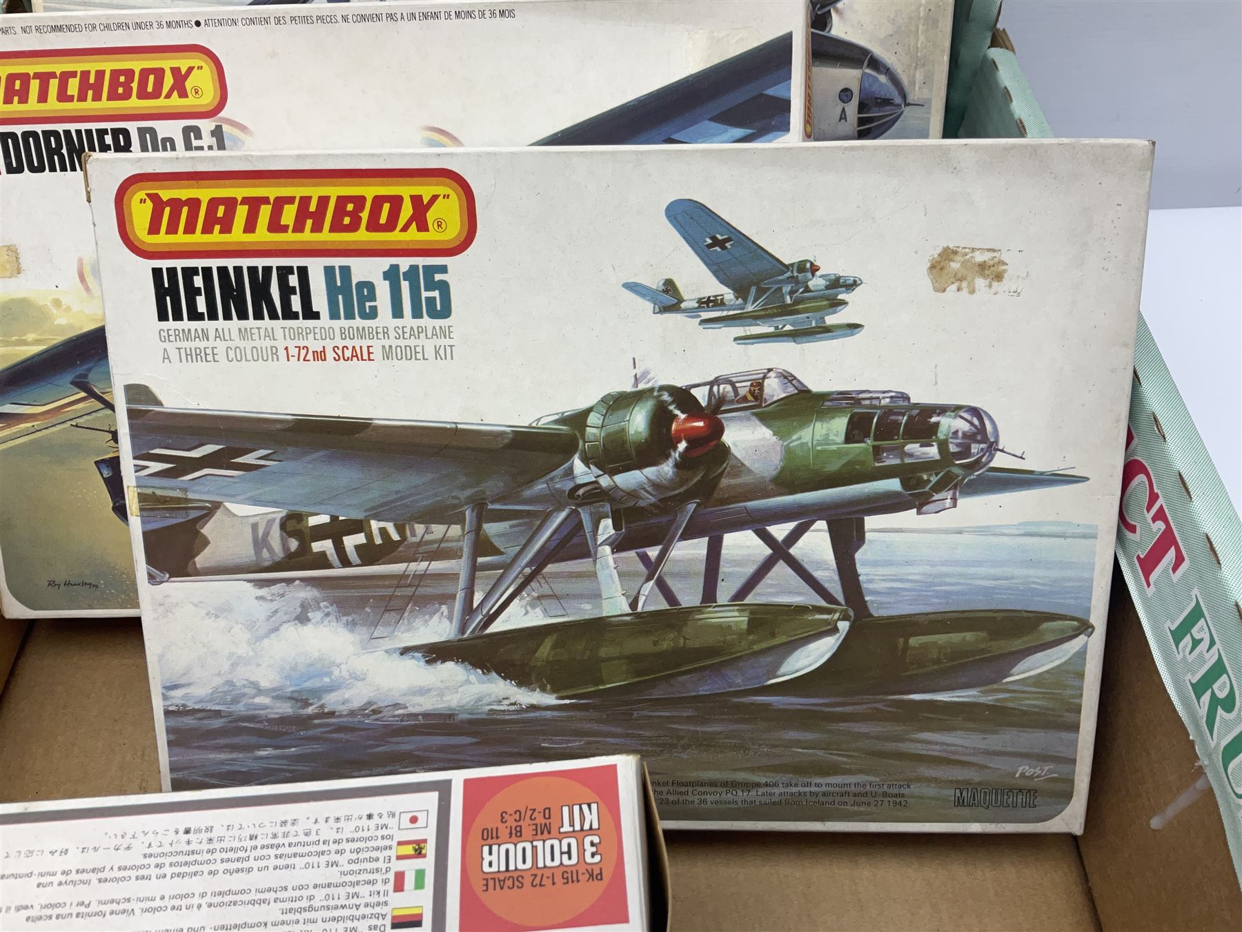 Twelve scale model kits, comprising ten model aircraft kits from Hasegawa, Nichimo, Fujimi and Matchbox, and two further Hasegawa 1:8 scale aircraft mounted machine gun kits, in two boxes 