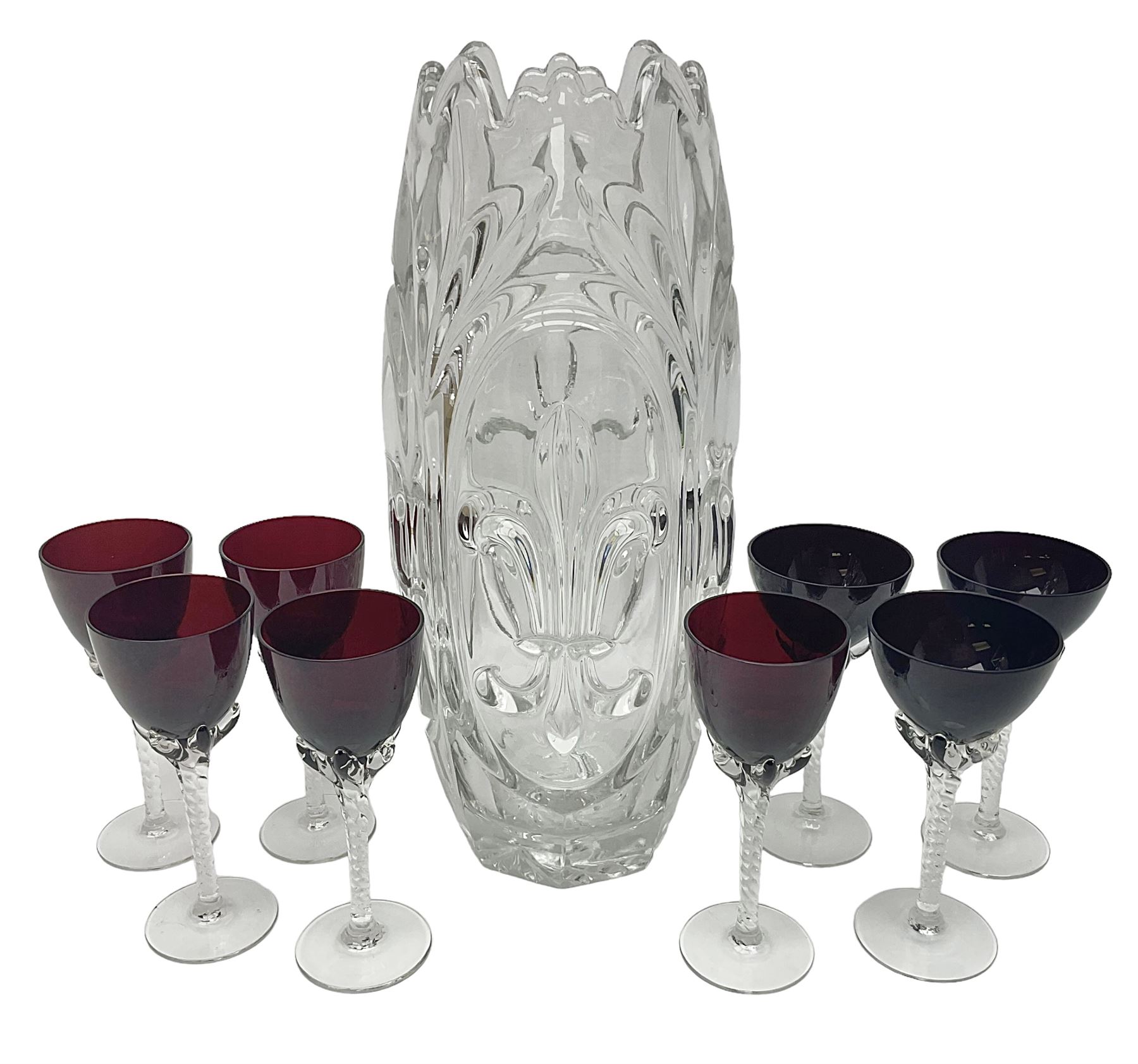 Glass vase in the style of Rudolf Schrötter for Rudolfova Hut, decorated fleur de lis, together with eight sherry glasses with cranberry bowls and twisted stems, vase H32cm 