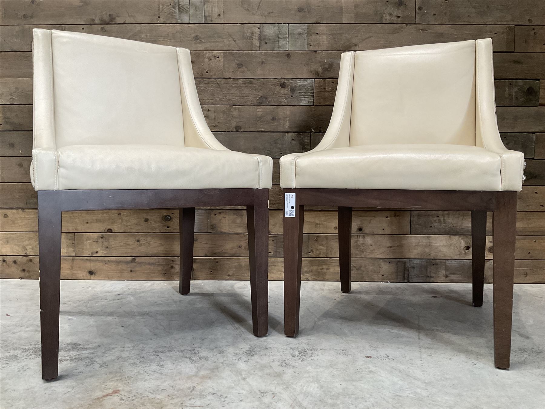 28 x walnut framed dining chairs, upholstered in beige leather