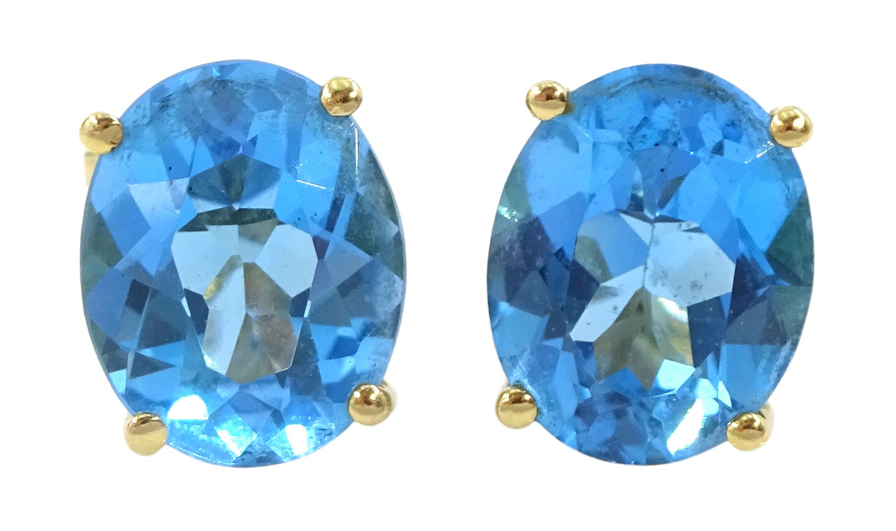 Pair of 18ct gold oval cut Swiss blue topaz stud earrings, stamped 750, total topaz weight approx 5.85 carat