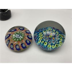 John Ditchfield for Glassform iridescent glass paperweight, together with two millefiori paperweights and one other 