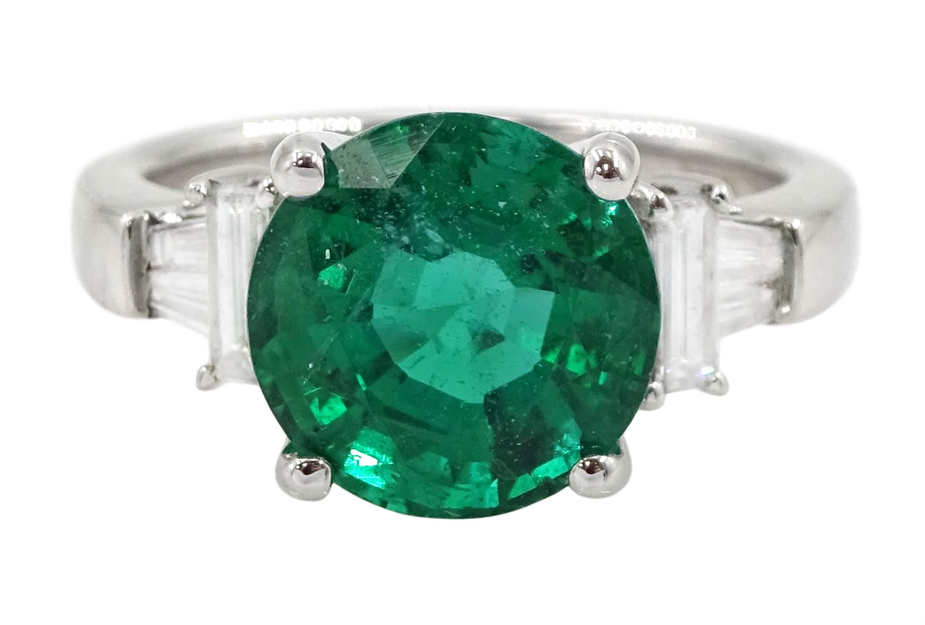 18ct white gold three stone round emerald, baguette and tapered baguette cut diamond ring, hallmarked, emerald approx 3.10 carat