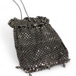 Silver mesh evening purse with long and short link strap, hallmarked import Birmingham 1913, together with an iron mesh evening purse with acorn drops, and a silver hair comb (3)