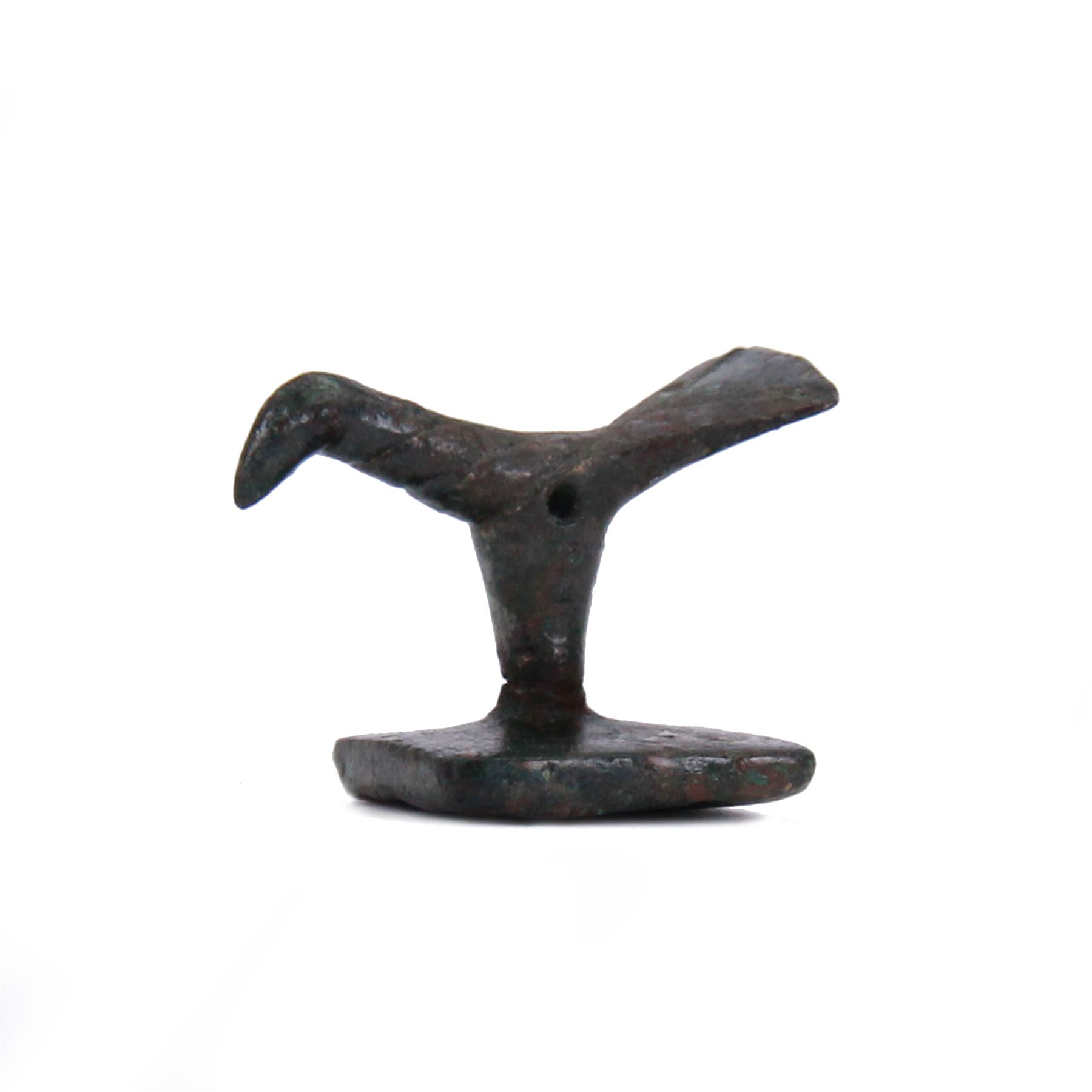 Greek bronze seal votive, probably Geometric period, modelled in the form of a bird, upon square base with X seal beneath, 2.5cm