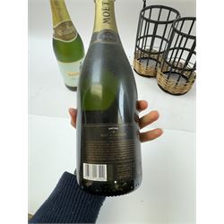 Moet & Chandon 1996 champagne, together with Babycham sparkling perry, in a wine holder, various contents and proof 