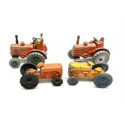Dinky - unboxed and playworn early die-cast models comprising Speed of the Wind racing car, two Auto Union Racing cars, two Field Marshall tractors (one with driver), Caravan trailer, Manure Spreader, three other trailers and two un-marked tractors (12)