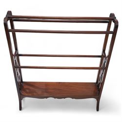 Edwardian mahogany towel rail, shaped and pierced splats and lower tier, on out splayed feet