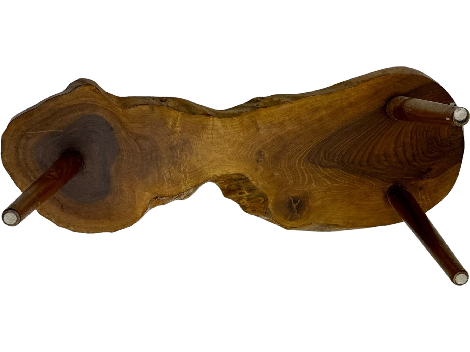 Mid-20th century live edge walnut coffee table, the top showcases the natural grain and organic form of the wood, supported by three tapered legs 