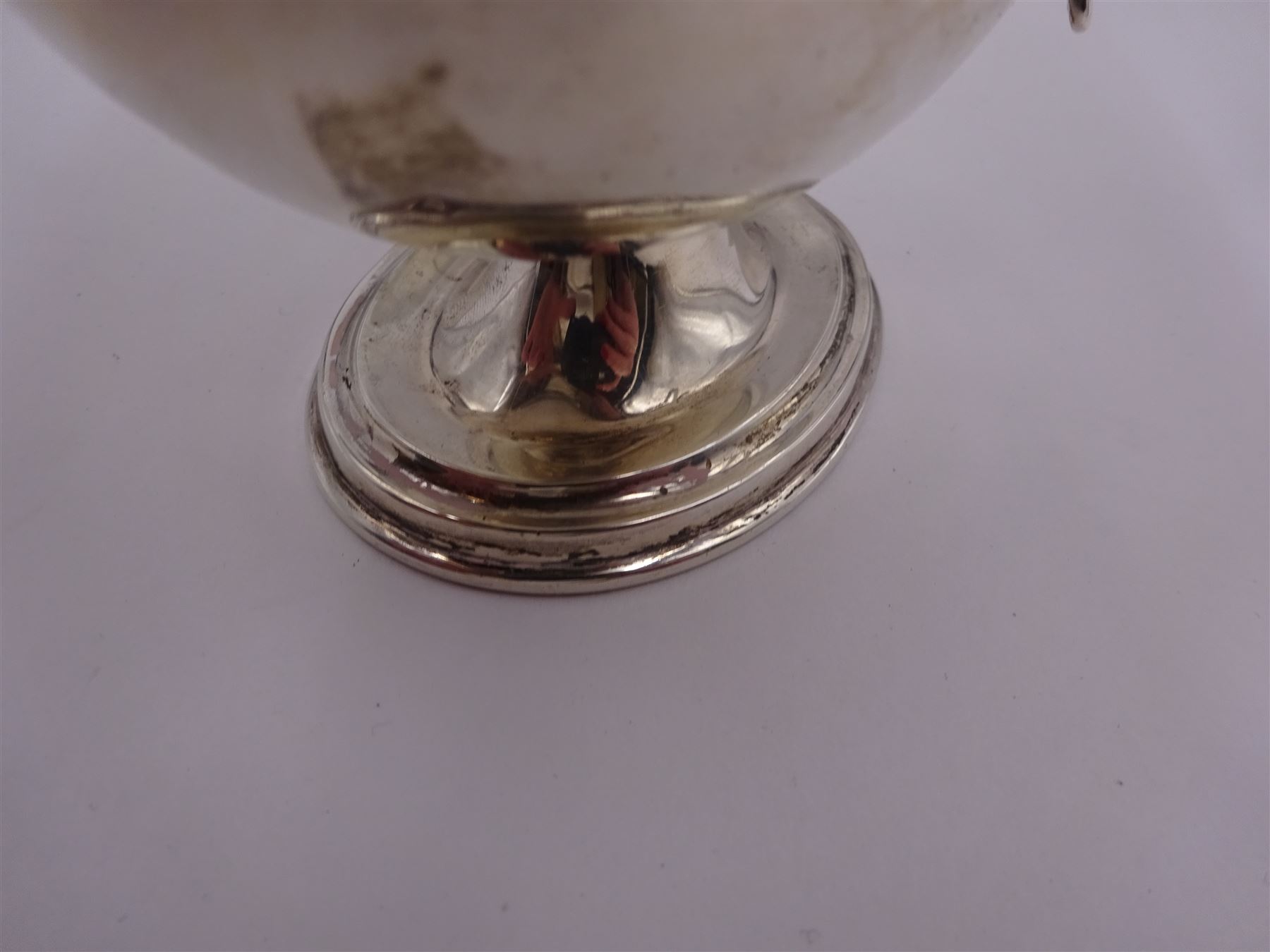 Edwardian silver twin handled pedestal dish, of navette shaped form, with twin loop handles, upon a stepped oval pedestal, hallmarked William Neale, Birmingham 1907, H9cm