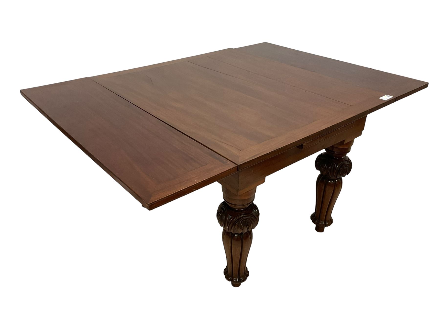 Victorian mahogany draw-leaf extending dining table, rectangular top with two additional leaves, on turned foliage carved and lobe moulded supports