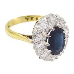 18ct gold oval cut sapphire and round brilliant cut diamond cluster ring, stamped, sapphire approx 1.20 carat, total diamond weight approx 0.80 carat