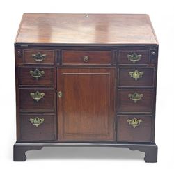 George III mahogany bureau, the fall-front enclosing fitted interior with pigeonholes and ...