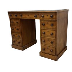 Victorian mahogany twin pedestal desk, rectangular top with inset green leather writing surface, fitted with central frieze drawer flanked by five graduating drawers on each side 