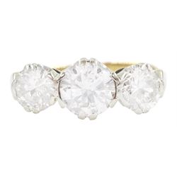 18ct gold three stone round brilliant cut diamond ring, stamped, total diamond weight approx 1.75 carat