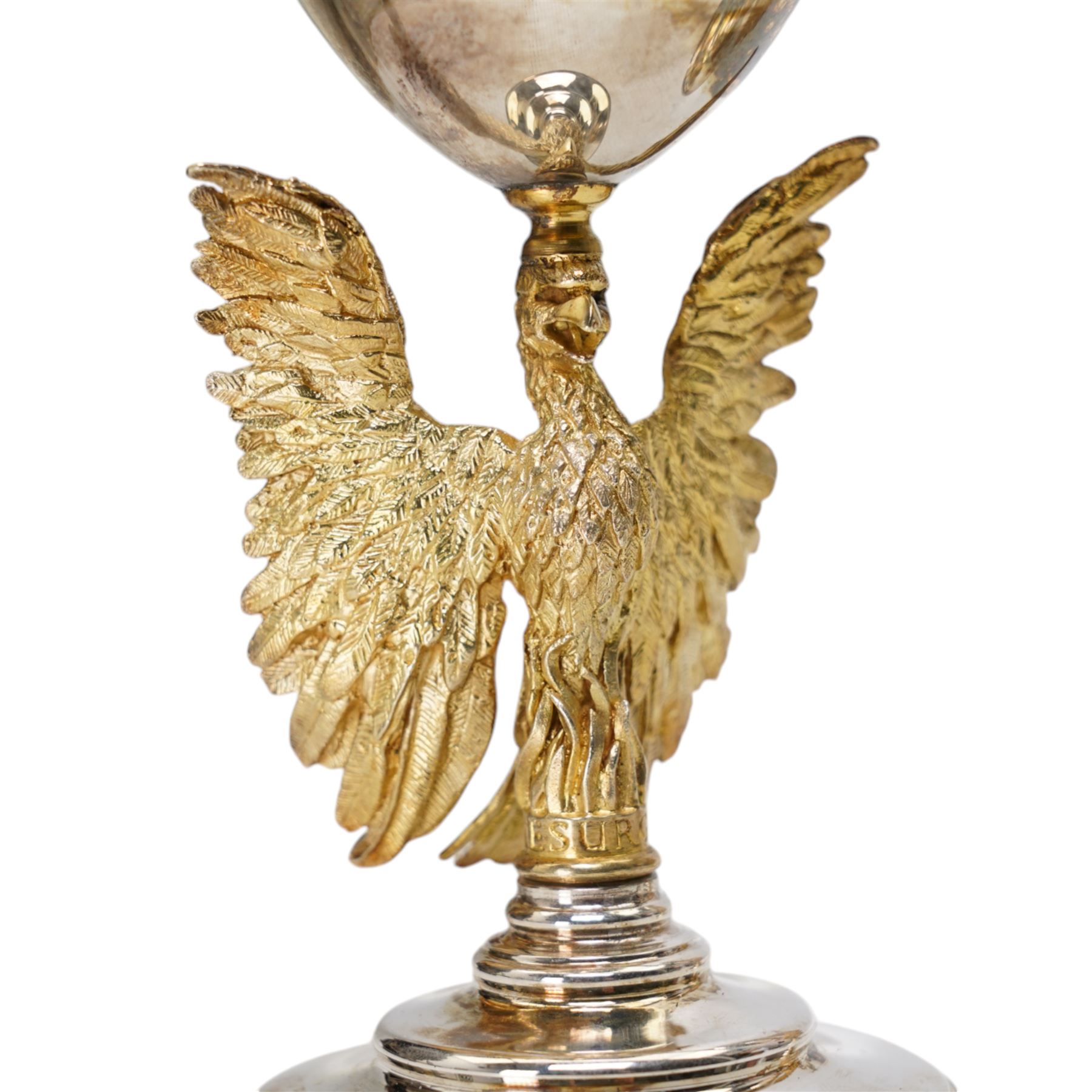 St Paul's Cathedral limited edition silver goblets, commemorating the 300th anniversary of the laying of the foundation stone of the cathedral in 1675, designed by Jocelyn Burton for Aurum, the gilt stems sculpted as phoenixes with outstretched wings supporting the bowl, the pedestals inscribed 'Resurgam', with gilded interiors, no. 188 and 189/600, hallmarked Jocelyn Burton, London 1975, H16cm, with certificates and original case