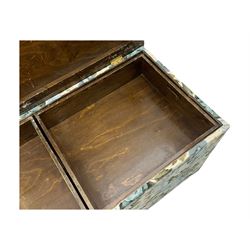 Mid 20th century oak blanket box, upholstered in floral pattern fabric, padded hinged lid enclosing oak interior with two removable trays, brass side handles, on round metal supports