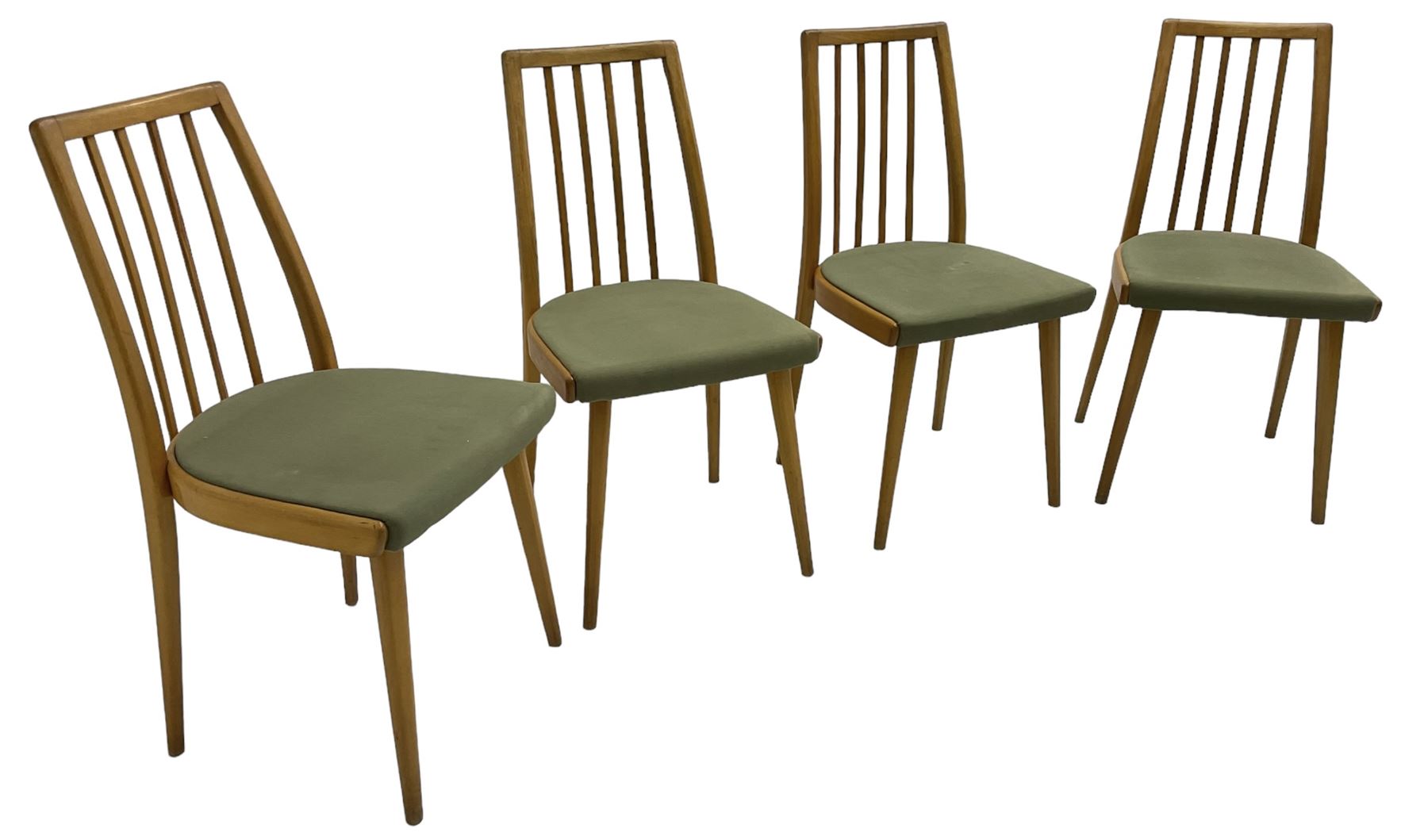 Set of four mid-20th century beech framed dining chairs, vertical slat back over upholstered seats, on tapering supports