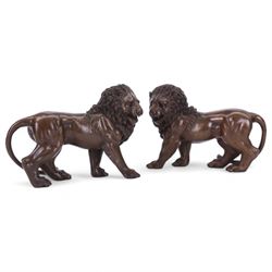 Pair of bronze figures, modelled as snarling lions, H22cm L30cm