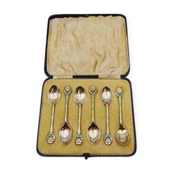 Set of six 1930s silver coffee spoons, each with enamelled daisy decoration to terminal with green and white enamelled stems, hallmarked Turner & Simpson Ltd, Birmingham 1936, contained within fitted case