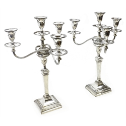  Pair Edwardian Adam style silver three branch candelabra, neo-classical decoration by Harrison Brothers & Howson, Sheffield 1904, H49cm (2)  
