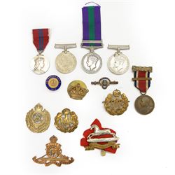 General Service Medal 1918-62, with Palestine 1945-48 clasp, awarded to 14124180 Sjt R.J. Foster R. SIGS, together with WWII George VI Defence medal and War medal, various cap badges etc 