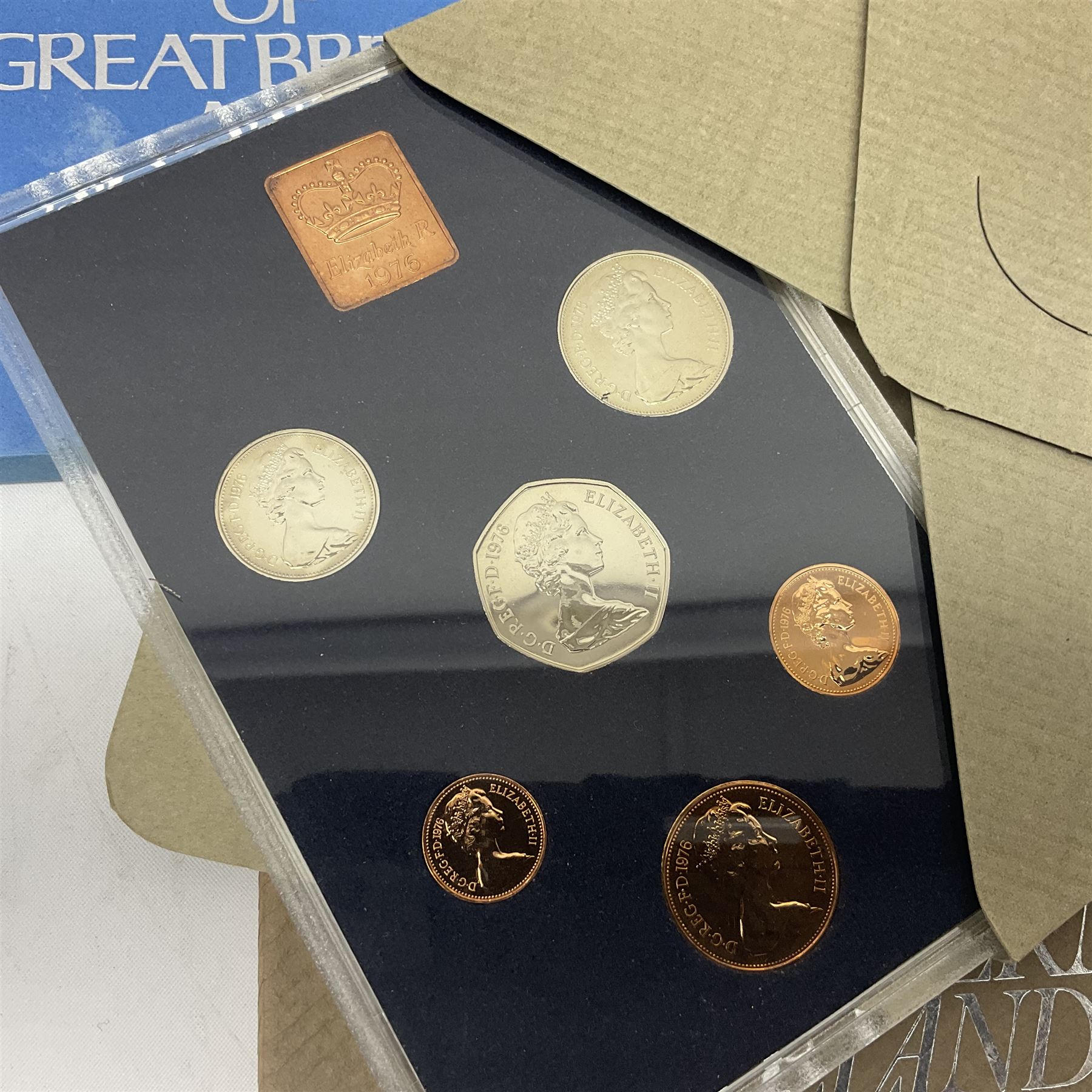 Eleven Great British coin year sets, dated two 1970, 1972, 1973, 1974, 1975, 1976, three 1977 and 1978, all in plastic displays with card covers