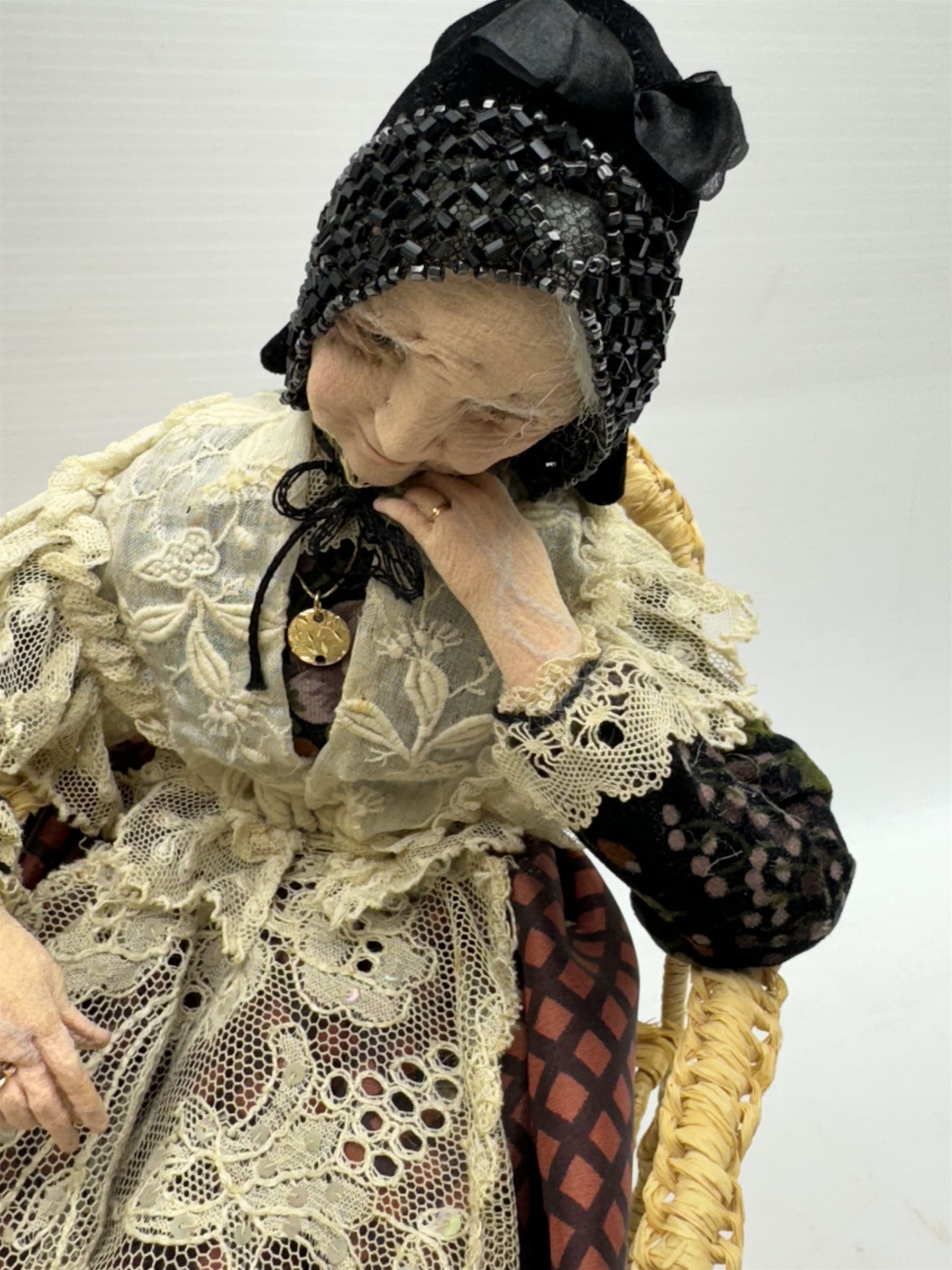 Anna Meszaros (Hungarian 1905-1998): 'My Great Granny', handmade needlework figurine, together with small plaster cast of a young boy by the same artist, granny H30cm
Auctioneer's Note: Anna Meszaros came to England from her native Hungary in 1959 to marry an English businessman she met while demonstrating her art at the 1958 Brussels Exhibition. Shortly before she left for England she was awarded the title of Folk Artist Master by the Hungarian Government. Anna was a gifted painter of mainly portraits and sculptress before starting to make her figurines which are completely hand made and unique, each with a character and expression of its own. The hands, feet and face are sculptured by layering the material and pulling the features into place with needle and thread. She died in Hull in 1998