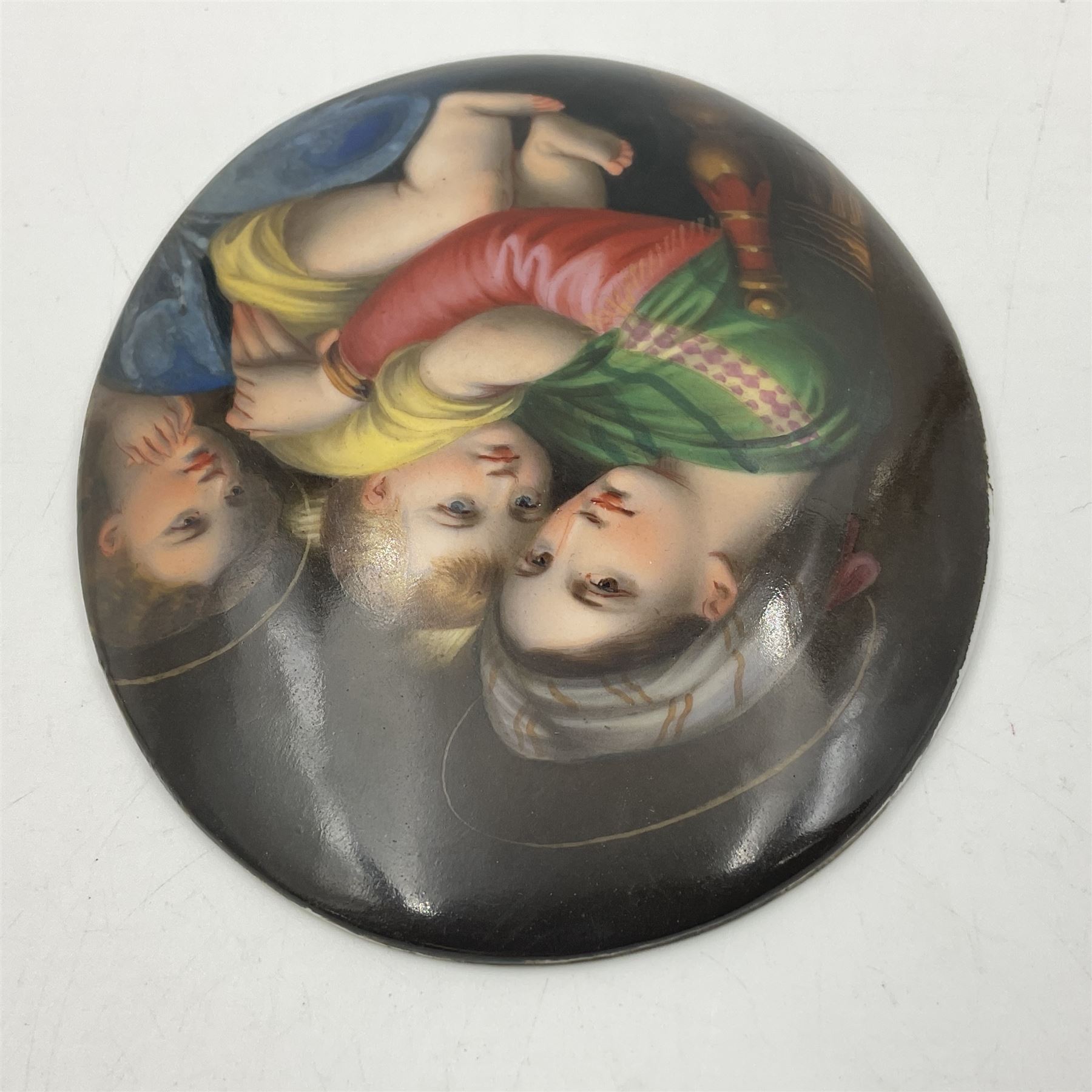 19th century Continental porcelain plaque, of oval form, painted with the Madonna and Child after Raphael, unmarked, possibly KPM, H12cm W9cm 