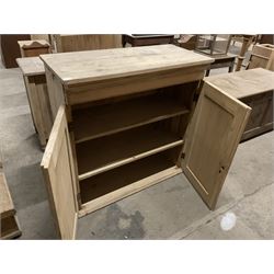 Stripped pine cupboard or bookcase, projecting cornice over two panelled doors, enclosing two shelves - THIS LOT IS TO BE COLLECTED BY APPOINTMENT FROM THE OLD BUFFER DEPOT, MELBOURNE PLACE, SOWERBY, THIRSK, YO7 1QY