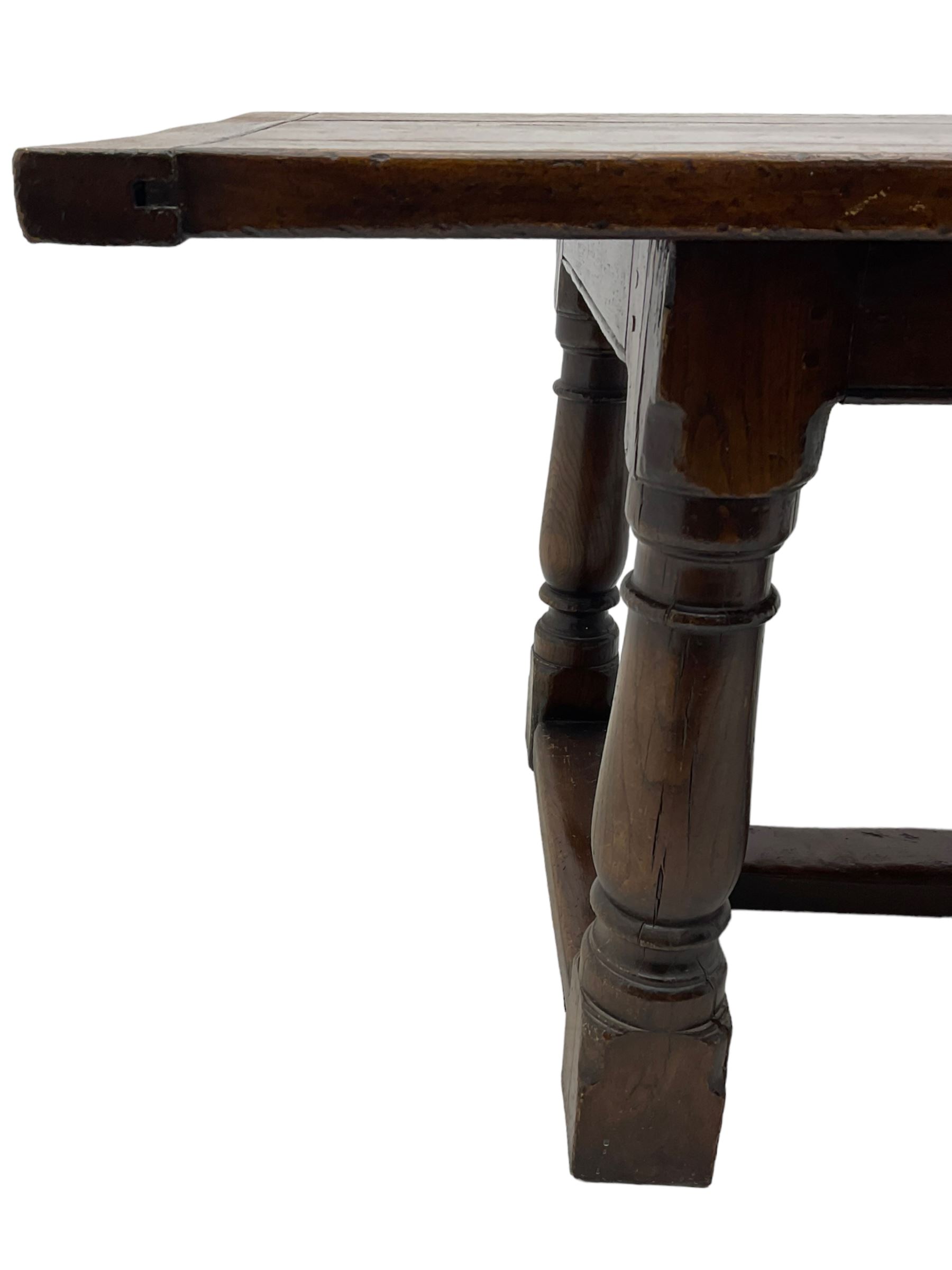 20th century Jacobean design oak refectory dining table, rectangular plank top with cleated ends, on turned supports united by H-stretchers 