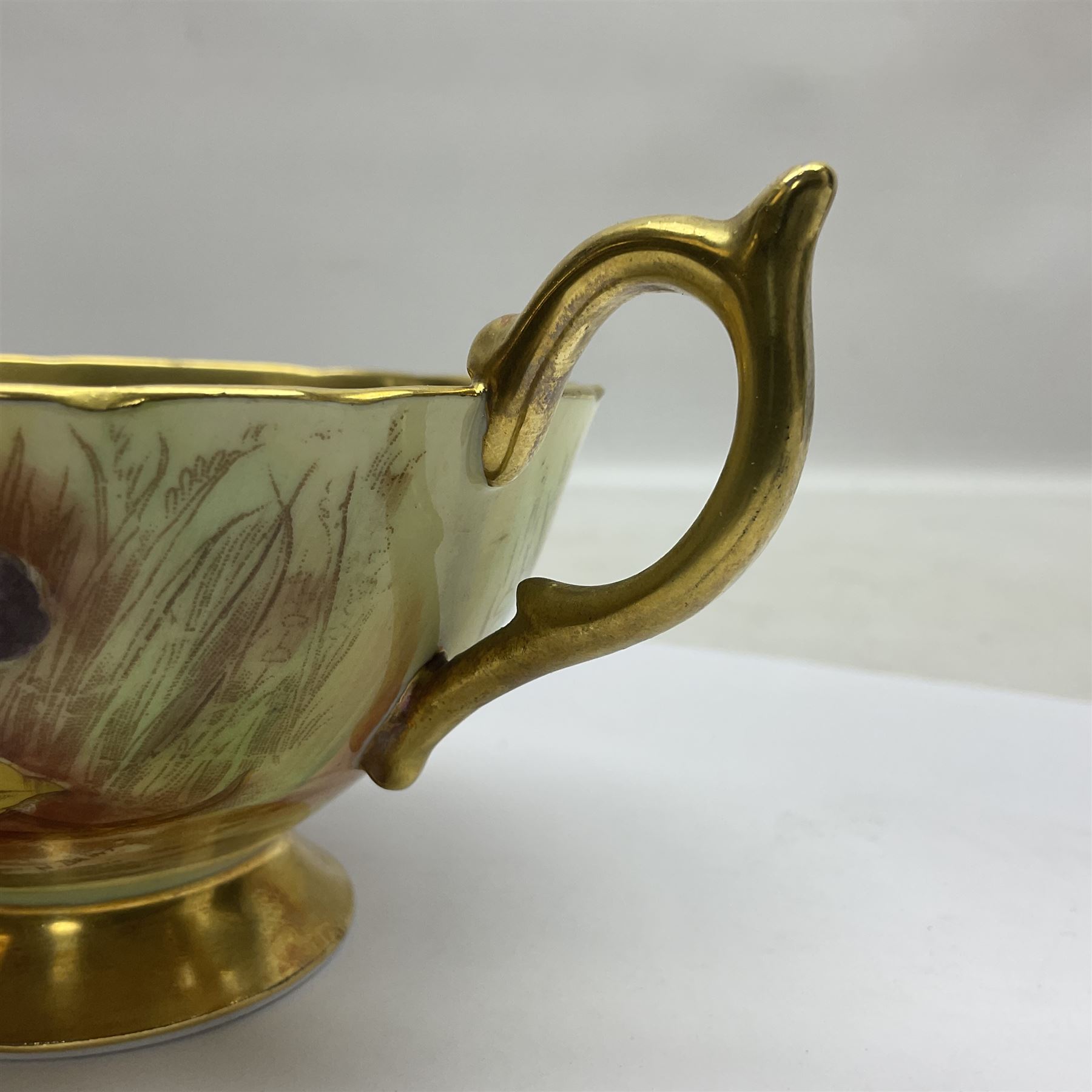 Pair Aynsley Orchard Gold pattern teacups and saucers with gilt interior 