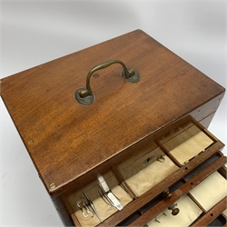  Dentistry - Late Victorian mahogany Dentists cabinet by C. Ash & Co, hinged cover above six long graduated drawers, enclosing a comprehensive arrangement of implements, pharmaceutical bottles, tools, modelling wax, porcelain teeth, 