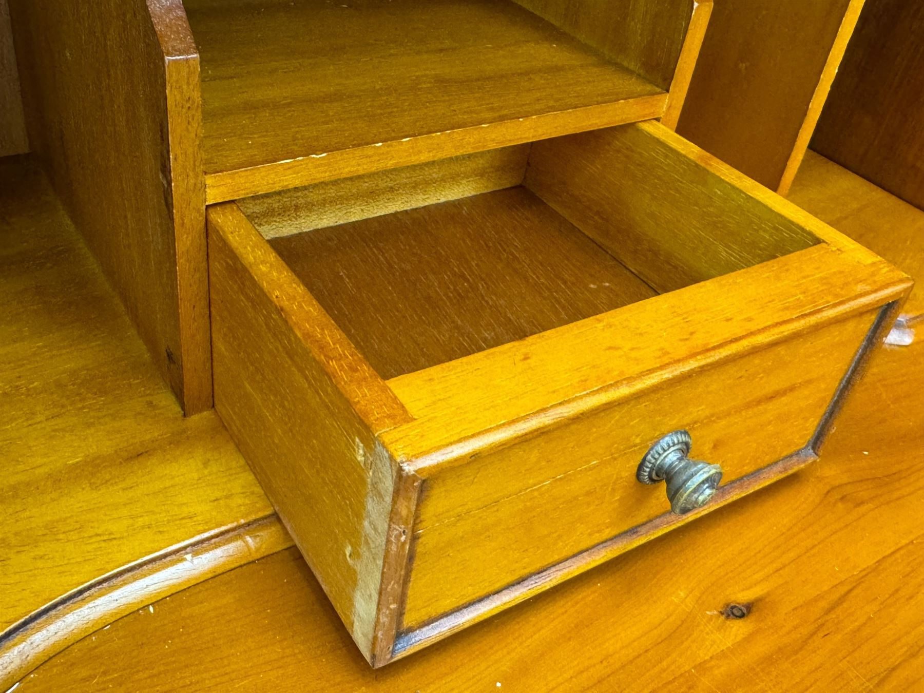 Mid-to-late 20th century yew wood bureau bookcase, raised bookcase enclosed by glazed door, the fall front revealing fitted interior, four graduating cock-beaded drawers below, on bracket feet