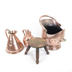 Helmet shaped copper coal scuttle with hammered finish, copper jug and a Guernsey style co...