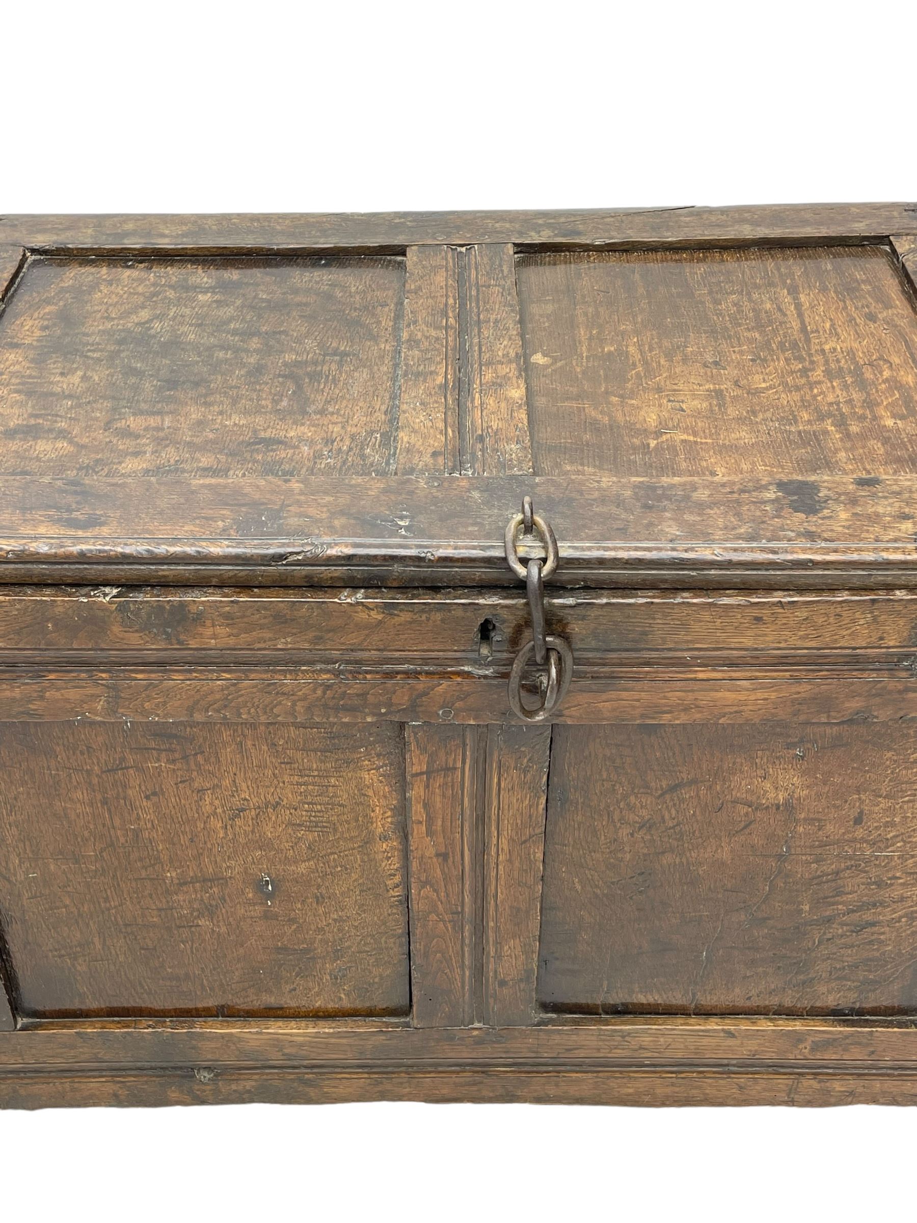 17th century panelled oak blanket chest or kist, quadruple panelled hinged lid over quadruple panelled front, moulded frame and pegged construction, on stile supports