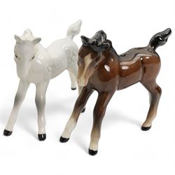 Group of Beswick horses and donkeys, including Connemara pony, a grey gloss stallion and foal, Black Beauty, another foal, two shire horses and two donkeys 