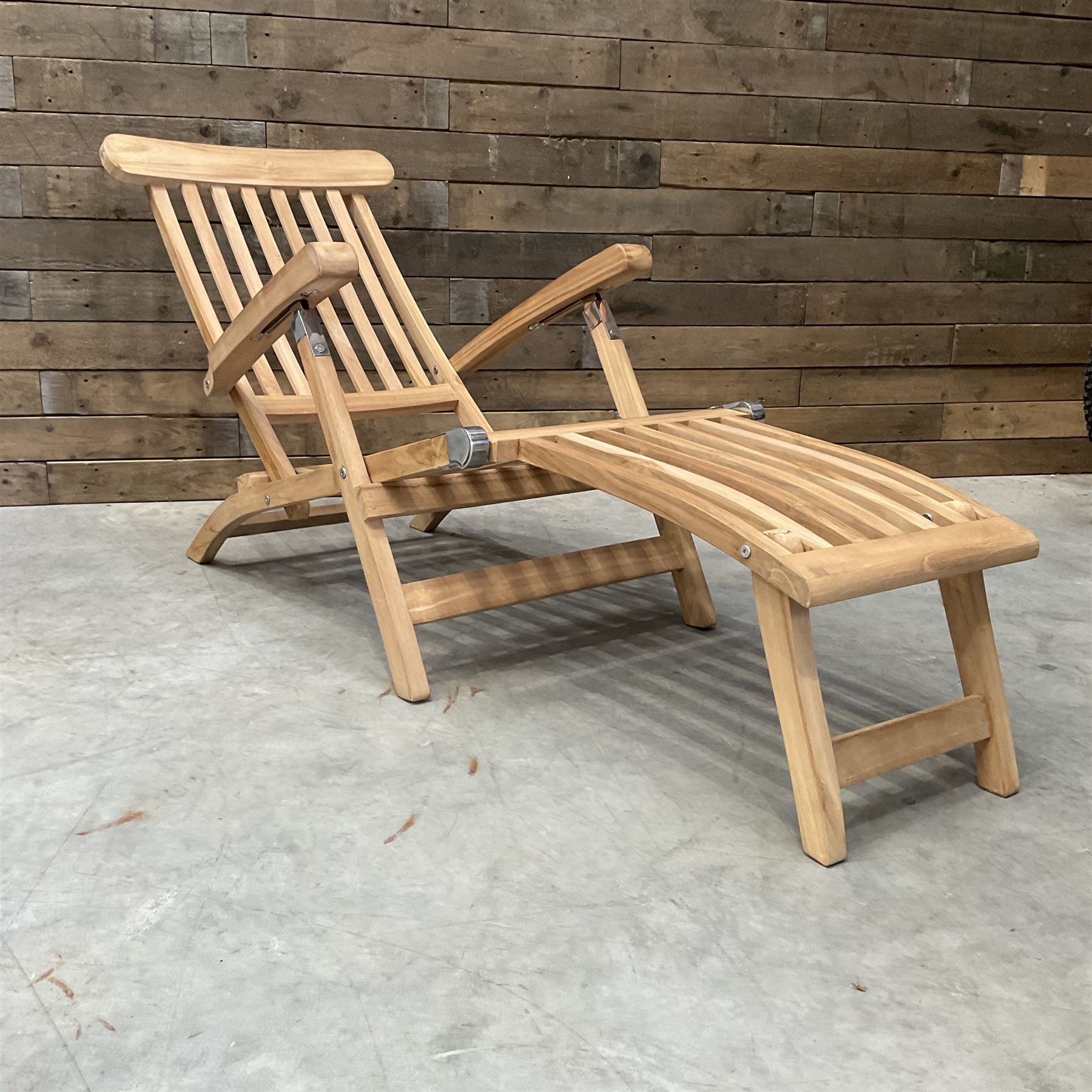 Pair of solid teak adjustable garden steamer armchairs, stainless brackets, with cushions