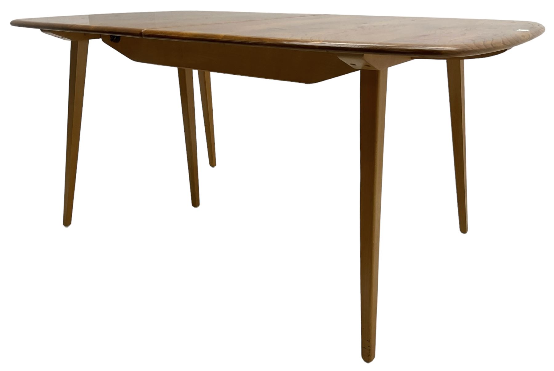 Ercol - light elm and beech 'Slide Leg Expanding Dining Table (444)', rectangular top with rounded corners, raised on tapered splayed supports, with two additional leaves