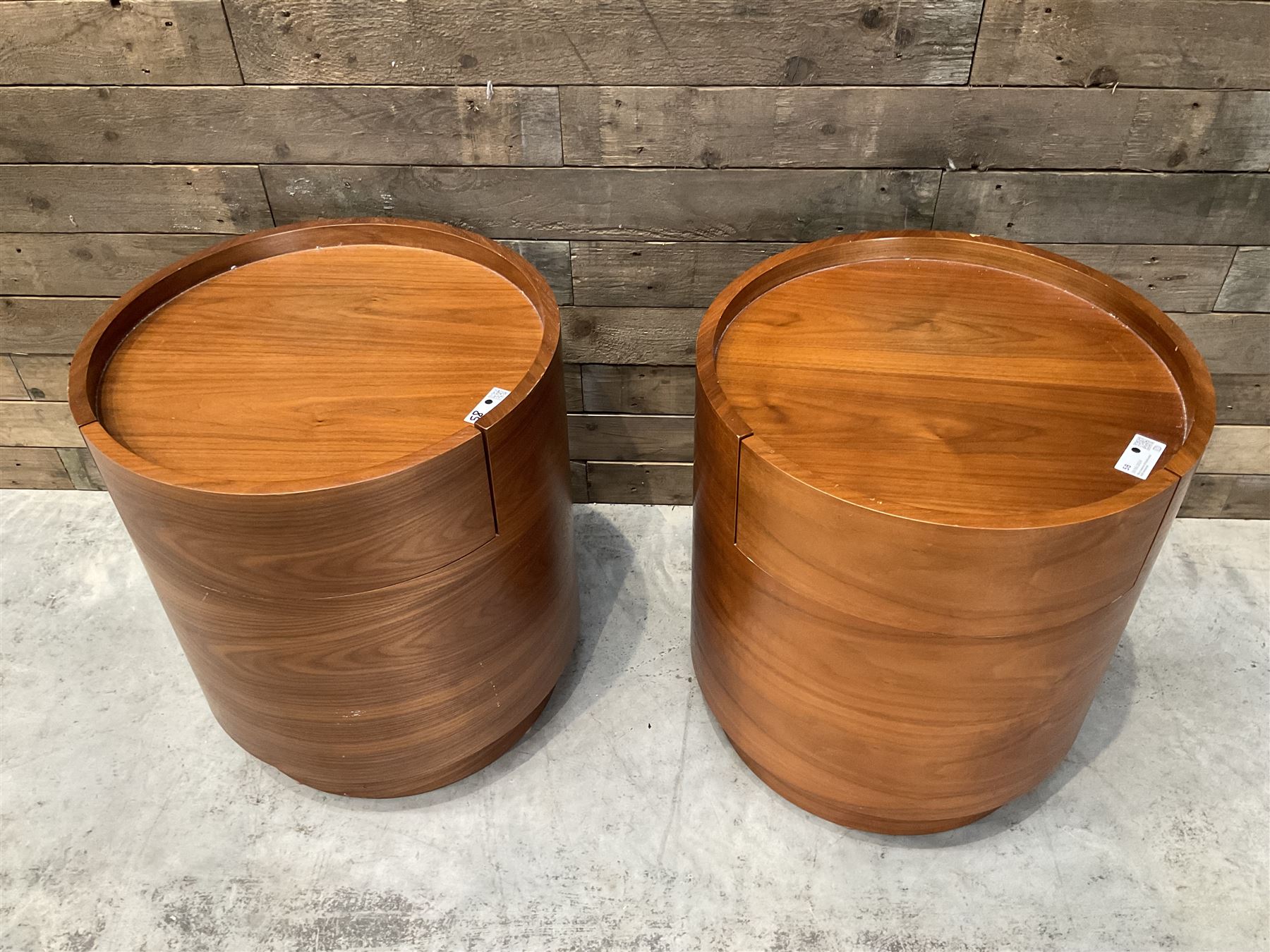 Pair of walnut circular barrel shaped lamp tables, fitted with single drawer