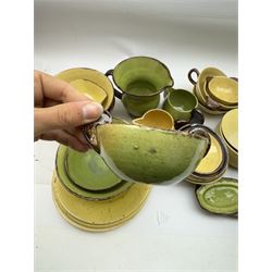 French green and yellow glazed tea and dinner wares by Etienne Noel, including milk jugs, teacups, side plates, bowls etc (43)