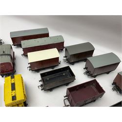 Hornby Dublo - forty-three goods wagons including nine tank wagons (Esso, Mobil, Vacuum, UD and Traffic Services), brake vans, meat and fish wagons, bogie well and bolsters, cable drums, open wagons, salt and grain wagons, etc; and six others by Tri-ang etc; all unboxed (49)