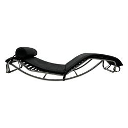 After Le Corbusier, Pierre Jeanneret, and Charlotte Perriand - LC4 chaise longue, black leather upholstery with cylindrical headrest, supported by a chromed tubular steel frame, with cantilever design with elastic webbing