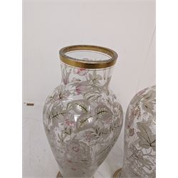 Pair of glass vases, of baluster form, painted with floral and foliate decoration, with gilt base and rim, H27.8cm