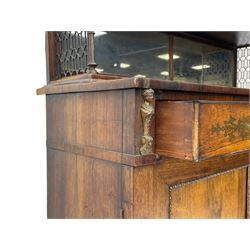 Attributed to John McLean & Son (London: 1770-1825) - Regency rosewood chiffonier, the raised two tier mirrored back on turned brass supports with brass trestle sides, rectangular top with brass stringing over two drawers and central cast brass satyr mask, cock-beaded drawer fronts inlaid with extending stylised foliate brass work, double cupboard below enclosed by panelled doors with cast egg and dart edging, matched brass inlays to the uprights, fitted with internal shelf, on turned compressed bun feet 