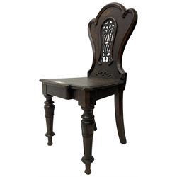 Victorian oak hall chair, the shaped back with fretwork splat, stepped moulded seat on turned lappet supports with fluting 