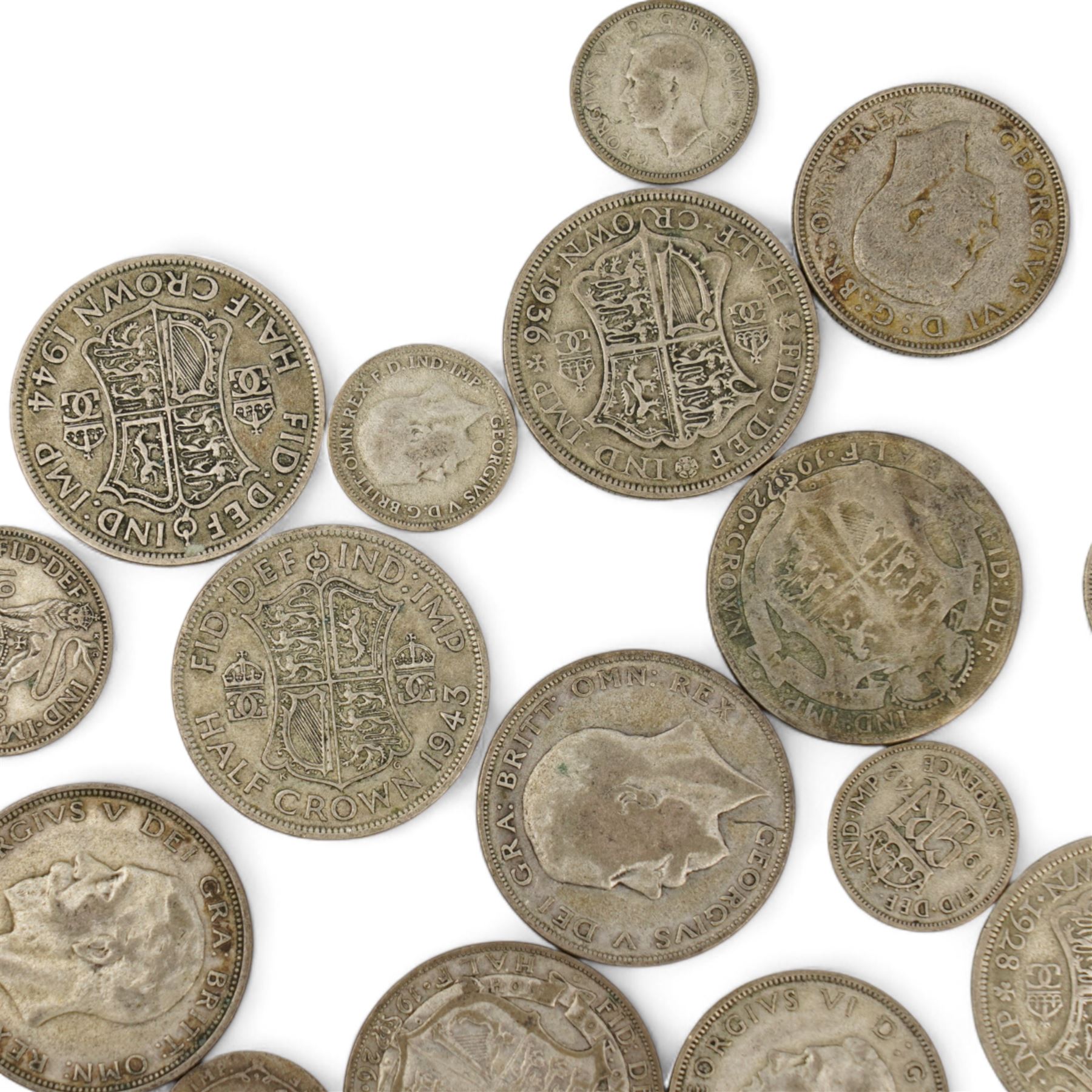 Approximately 610 grams of Great British pre 1947 silver coins, including sixpences, shillings, two shillings, halfcrowns etc