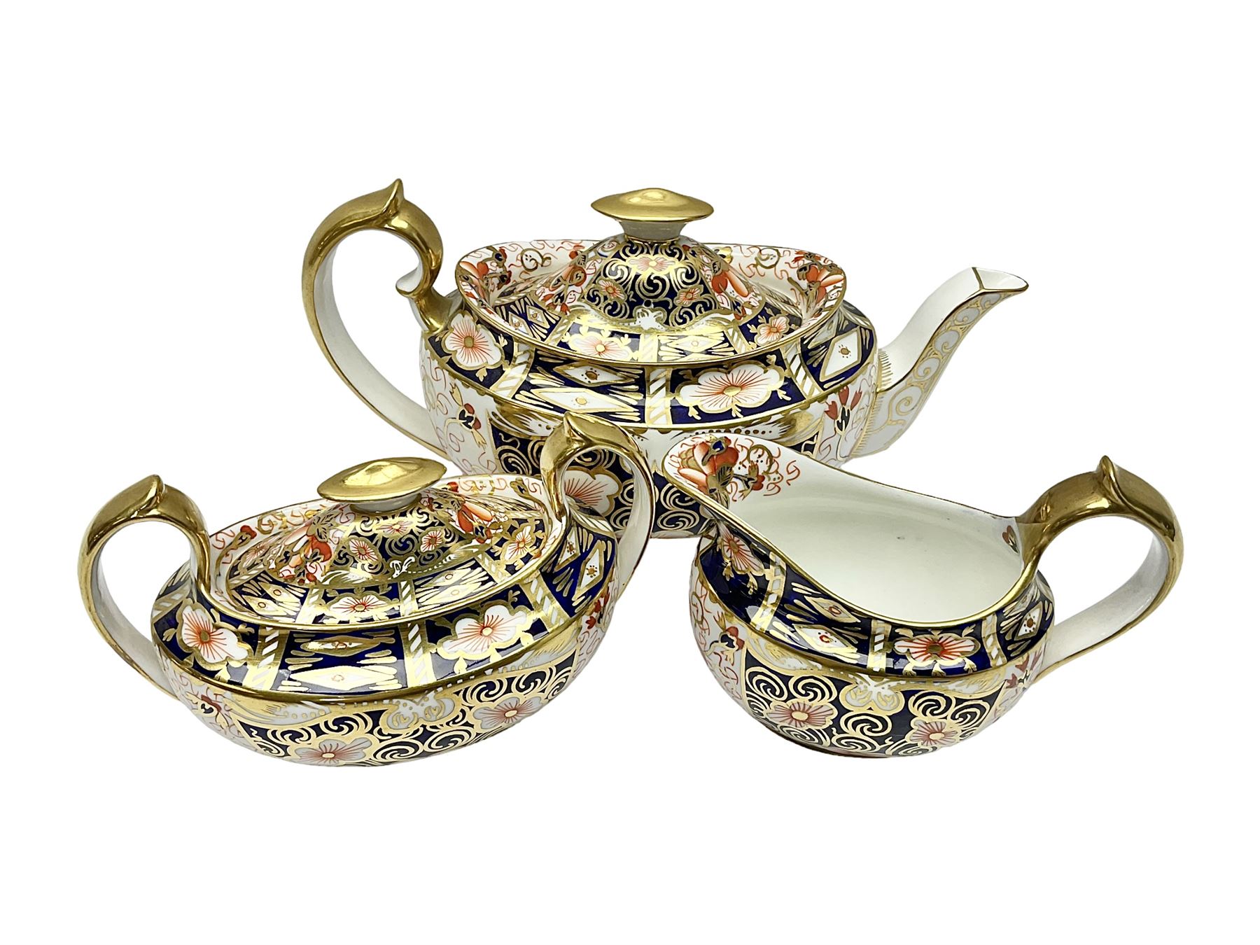 Royal Crown Derby 2451 Imari pattern three piece tea set, comprising teapot, covered sucrier and milk jug, teapot H12cm 